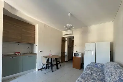 Image de Cozy apartments for a family vacation within walking distance of the sea