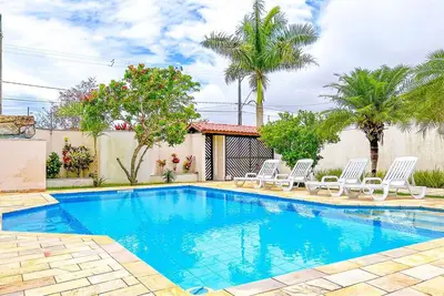 Image de Casa com churrasqueira e piscina em Itanhaém