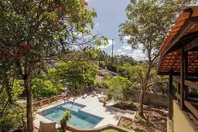 Image de Casa com Piscina, Salão de jogos e Churrasqueira