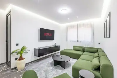 Image de Appartement moderne & cosy avec salon design – Idéal séjour détente