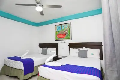Image de 4 Rooms w/ 2 Double Beds Each + Free Parking | Explore Cancún's Attractions!