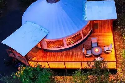 Modern Luxury Yurt with Firepit Table & Skylit Dome near Carson, Washington