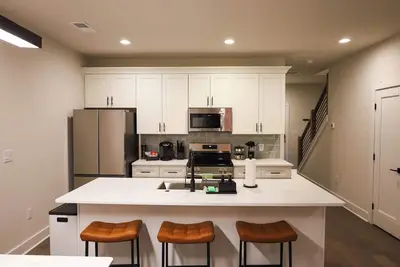 Image de Luxury new construction centrally located townhome, with attached Garage