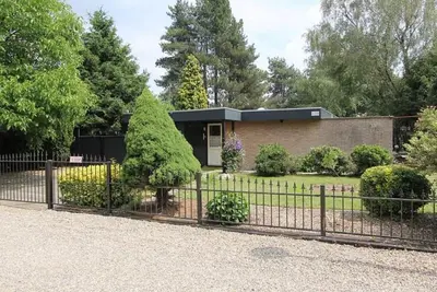 Image de Belle maison dans une région boisée