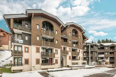 Image de Maison alpine avec balcon près des pistes