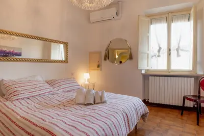 Image de Casa Vacances « Les trois fenêtres sur l’Amphithéâtre – Lucca » avec Wi-Fi et climatisation