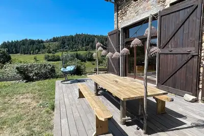 Image de Maison de campagne « Terrasse de Genestoux » avec terrasse et cheminée