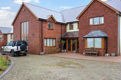 Image de 5 chambres à coucher à Llangrannog