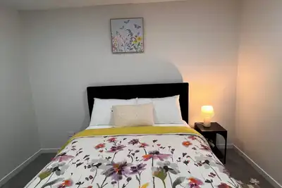 Image de Sj House easy access to the Airport and two minutes walking distance to the Mall