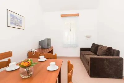 Image de Appartement en bord de mer à Umag avec piscine