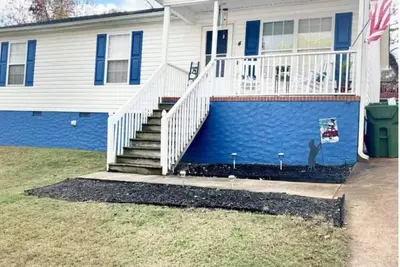 Image de Cozy 2-bedroom house with 75in Tv, King bed, fire pit