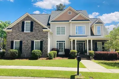 Image de Masters Rental 4-bedroom house in Golf Course Community