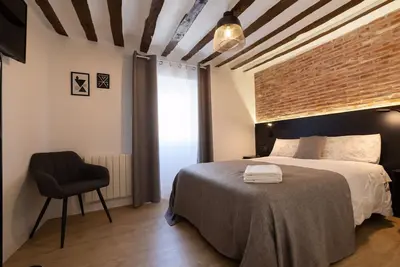 Image de Appartement Central Près de la Gastronomie Locale - WiFi Inclus