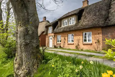 Image de Westertilli 8 – Maison au toit de chaume avec jardin romantique