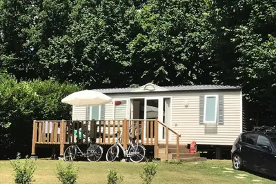 Image de Mobil-home 2 chambres :Terrasse au soleil, pelouse pour jouer, détente assurée. 4 personnes