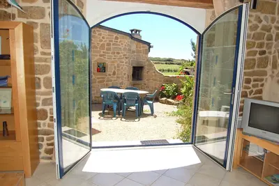 Image de Maison de vacances « Ty Mamm Gozh » à 400 m de la plage, vue mer, terrasse privée, Wi-Fi