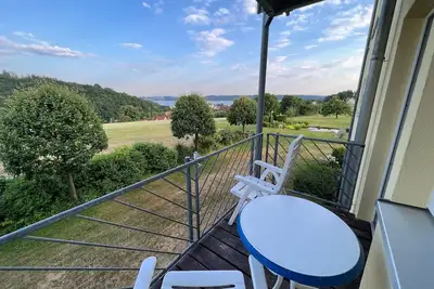 Image de Appartement familial acceptant les chiens, vue sur le lac et balcon couvert