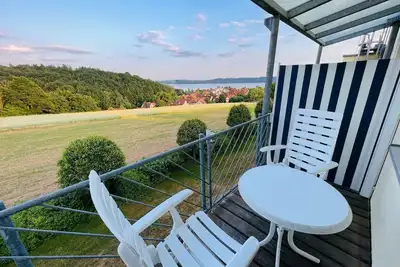 Image de Appartement familial acceptant les chiens, vue sur le lac et balcon couvert