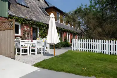 Image de Appartement 'Fewo Mirja' avec terrasse commune, jardin partagé et Wi-Fi