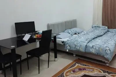 Image de Wonderful 3-bedroom apartment with Ac in vibrant Muscat. Fast net 10 min Airport