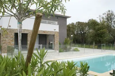 Image de Wohnung (T3) **** Ghisonaccia Corse mit Pool by Interhome