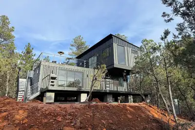 Image de Pine unCONTAINED - Modern container home with a wildlife pond & mountain views!
