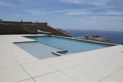 Image de Mykonos Villa Coralba with swimming pool, helipad, sunset and sea view