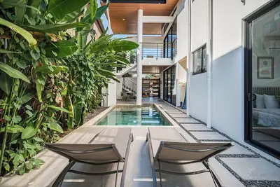 Image de Beautiful and comfortable home located in Hermosa Palms Casa 71, just steps from the beach. This tropical getaway offers spacious living areas, a fully equipped kitchen, and access to exclusive community amenities including pools.