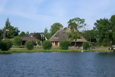 Image de Vacation apartment directly at the fishing pond with parking lot and terrace