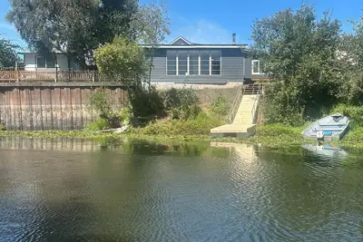 Image de Charming 2 bed, 2 bath waterfront home w/ Dune access