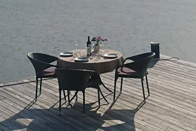 Image de Directly by the sea - own private quay with bath, fishing and boat mooring.