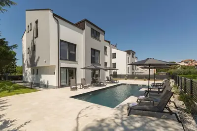 Image de Appartement de vacances avec climatisation et piscine à usage commun