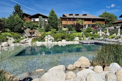 Image de Huberhof - Lumen, vacation apartments with pool, sauna, garden & family idyll.