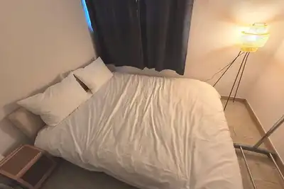 Image de Cozy home 9 Min to Line 2 & 5  Netflix & Free WiFi