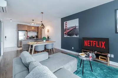 Image de Loft | Smart Tv + kitchen + Gym | 98 Walkscore