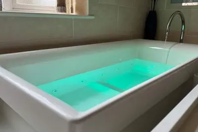 Image de Spacious 2-Bedroom Duplex with Jacuzzi Bath Tub