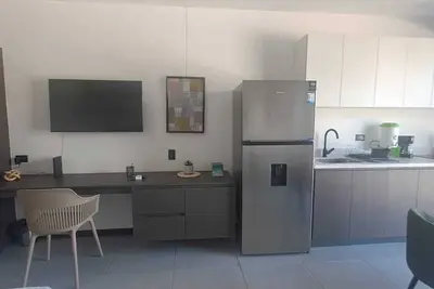 Image de Apt/Loft San Benito steps from stores and restaurants, hotel zone.