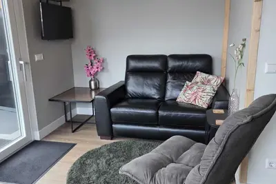 Image de Chalet called Jopie is a cozy chalet 50 meters from the sea.