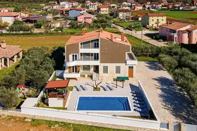 Image de Villa B 1 with pool and playground