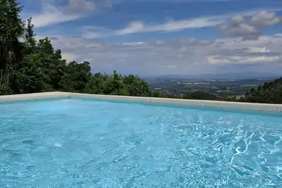 Image de An Authentic Tuscan Country House! It is a charming residence, with all modern comforts recently restored, reserved only for lovers of silence and panorama, immersed in nature and in the family olive grove from which an excellent oil is produced. The view