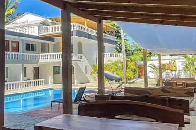 Image de Comfortable 2br • Walk to Beach • WiFi • Pool • Ac