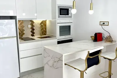 Image de Appartement climatisé à 50m de la plage, Wi-Fi gratuit, pour 4 personnes