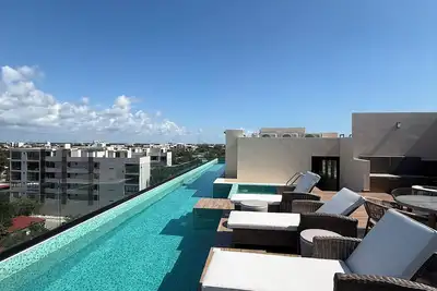 Image de 10 min. from beach, New luxury condo w/ Pool, Gym, Sauna, Parking and laundry!