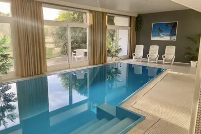 Image de Wellness vacation apartment in the Black Forest | pool & sauna | suitable for groups| Bühl