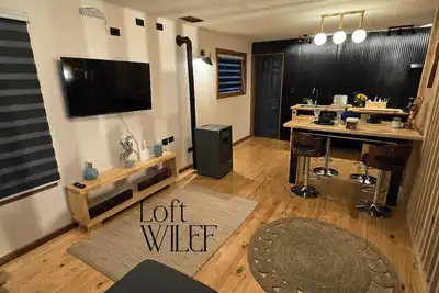 Loft Wilef, exclusive beachfront retreat with private Jacuzzi for couples.