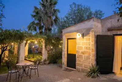 Image de Appartement « Masseria De Donno - Melograno » avec piscine partagée, Wi-Fi et climatisation