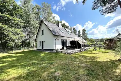 Image de Modern vacation home \"Anker 2\" with fireplace, underfloor heating & garden with dog