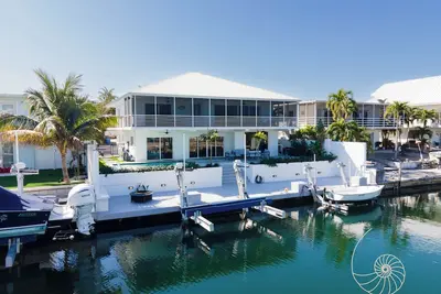 Image de Coral Key ~ 4 Bed / 3 Bath Canalfront Islamorada Retreat w/ Pool & Dockage