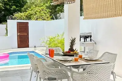 Image de Private Pool Bungalow | 10 min to Mambo Beach