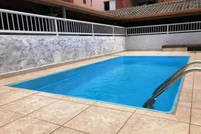 Image de Ubatuba Home Condominium. In the city center, strategic point.